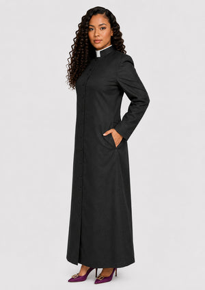 Woman wearing a black cassock with a white collar on a  white  background