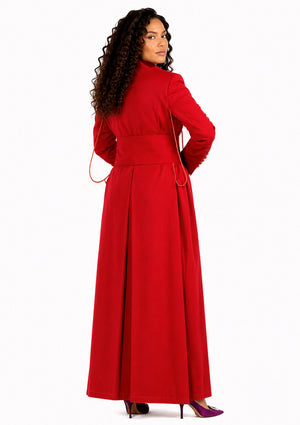 Woman wearing a red cassock on a white background