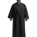 Man wearing a black robe on a white background.