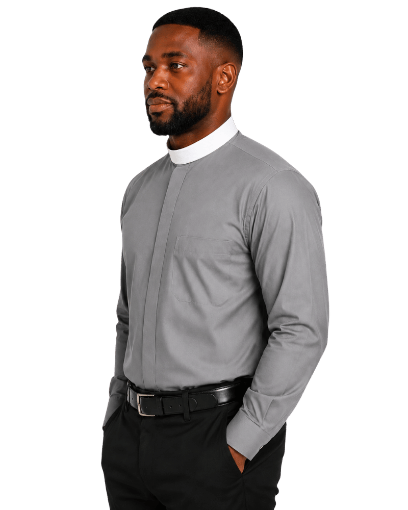 A man wearing a light gray long-sleeve clerical shirt with a white collar, black trousers, and a black belt, shown in profile against a plain white background.