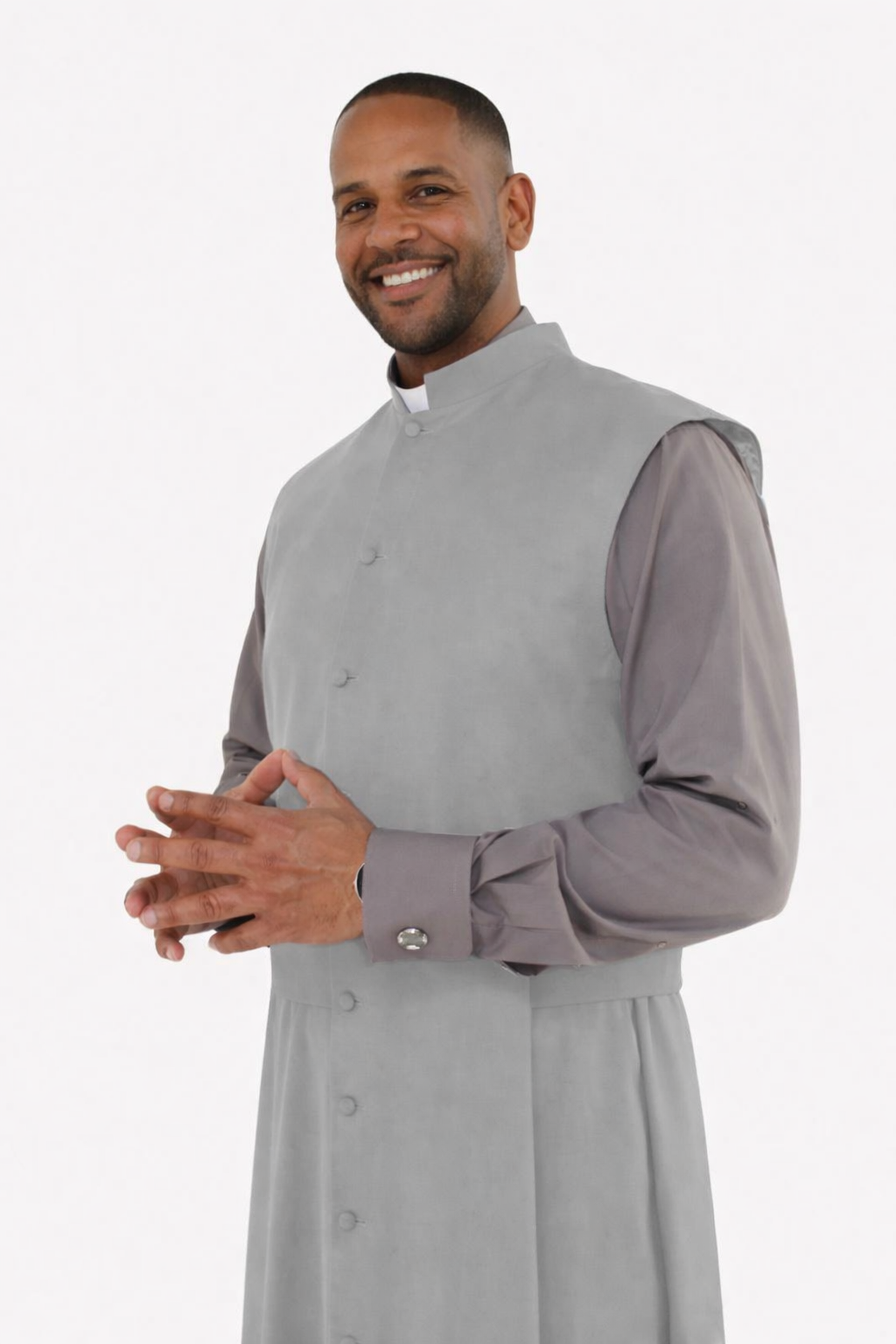 Man wearing a gray traditional outfit on a white background