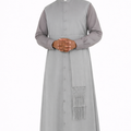 Man wearing a gray robe on a white background