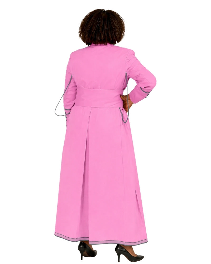 A woman viewed from the back wearing a long pink cassock with long sleeves, a waist tie, and black high heels against a plain white background.