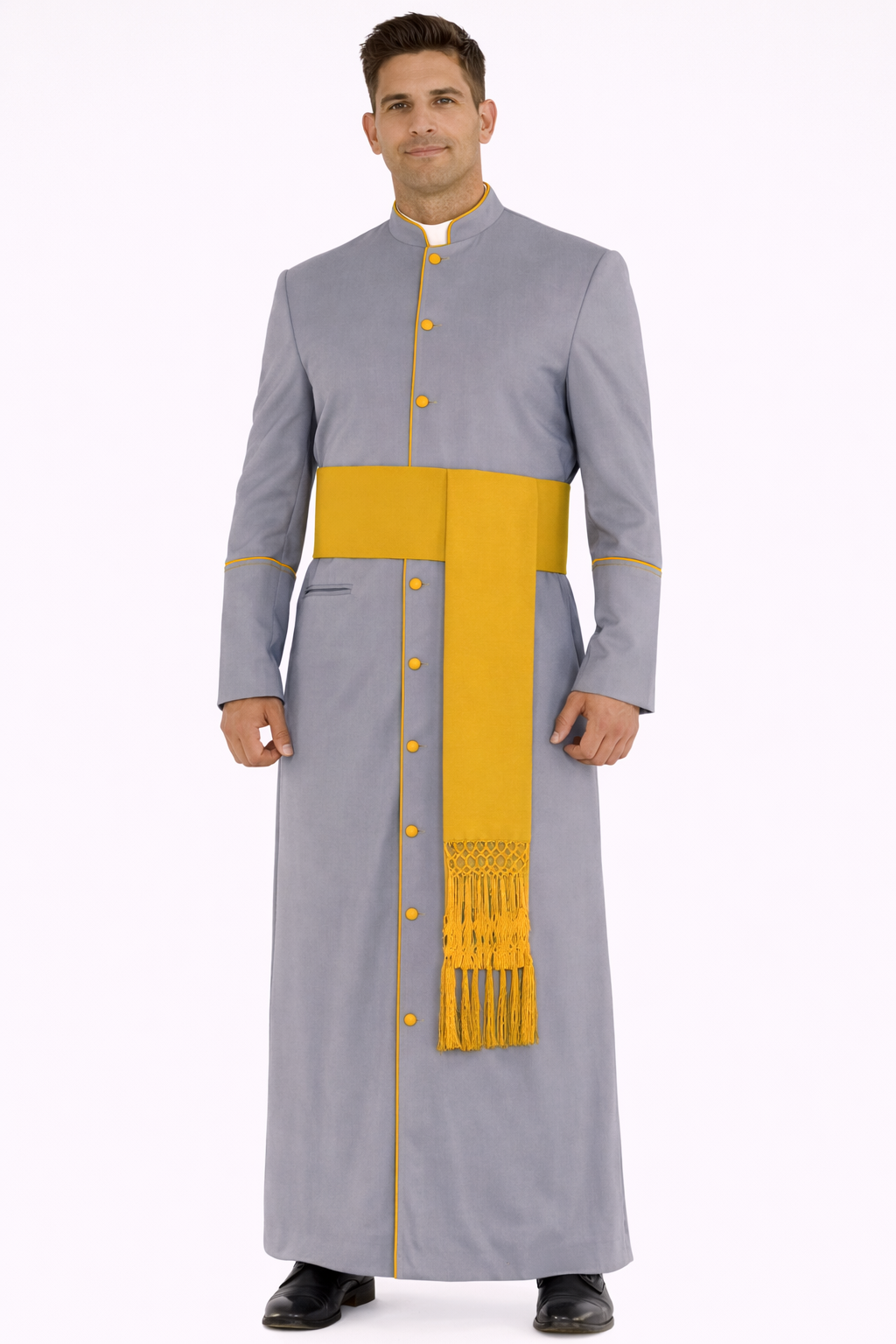 Man wearing a gray and yellow robe with a white background