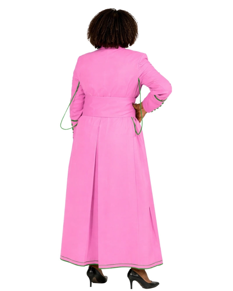 A woman shown from the back wearing a bright pink long cassock with green piping details, paired with black high heels, against a plain white background.