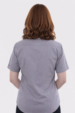 women wearing a gray shirt from behind on a white background