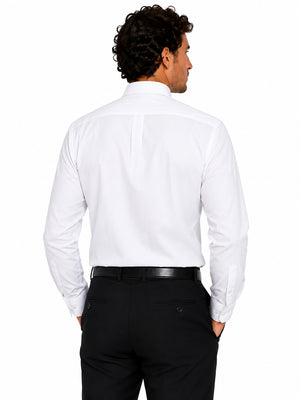 Man wearing a white clerical shirt and black pants on a white background
