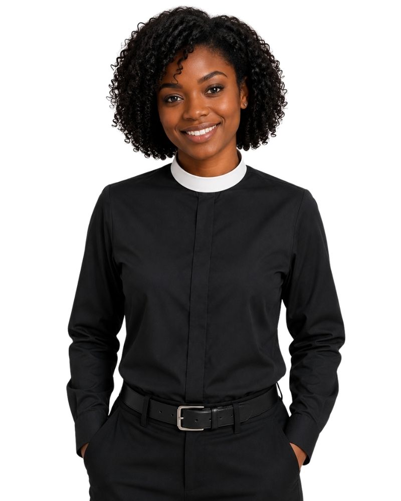 A woman shown from the front wearing a black long-sleeve clerical shirt with a white collar, paired with black trousers and a black belt, against a plain white background.
