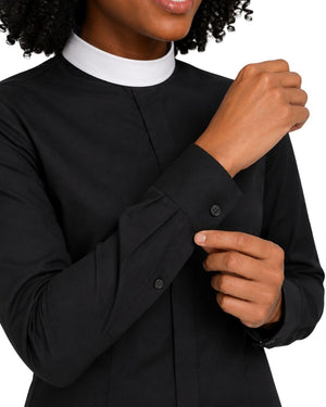 closeup of cuffs women wearing clerical shirt on plain white background 