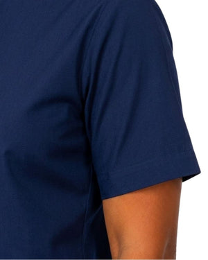 Close-up of a women wearing a short-sleeve navy blue clerical shirt, showing the sleeve and side seam against a plain white background.