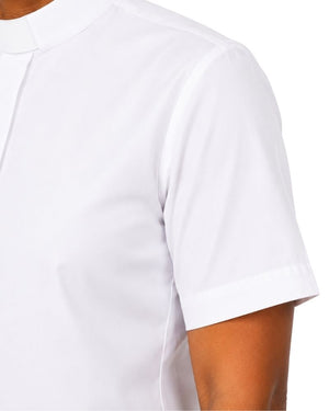A close-up of a women wearing a white clerical collar shirt, showing the collar against a plain white background.