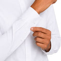 close up of the cuffs women wearing clerical shirt on plain white background.
