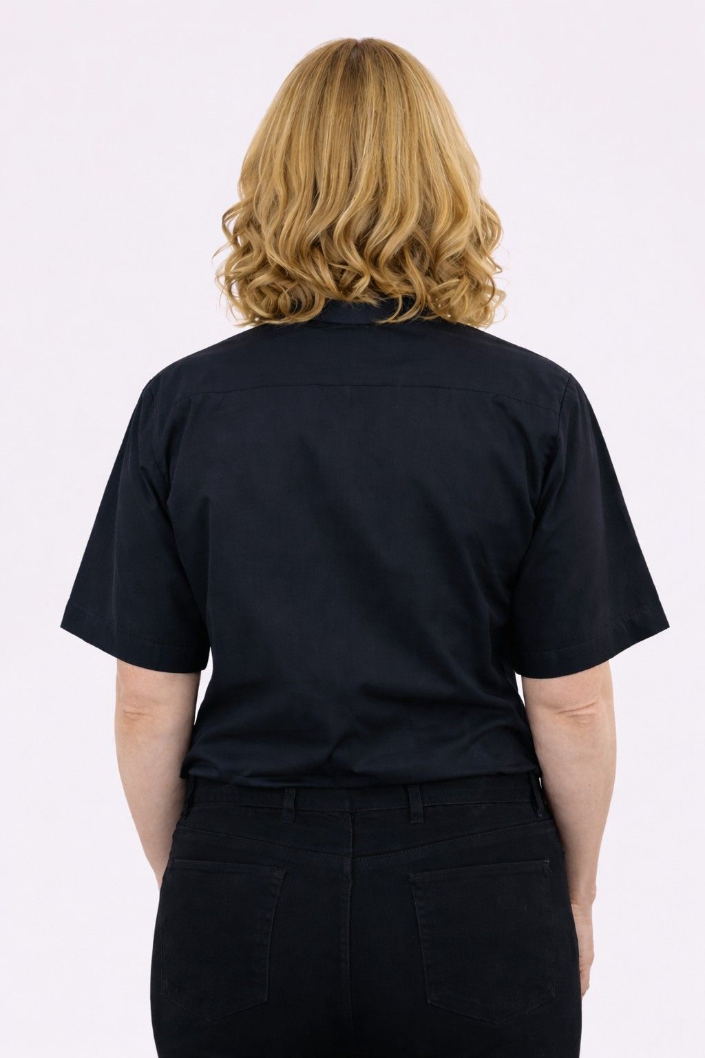 women wearing a black clerical shirt with a white collar on a white background.