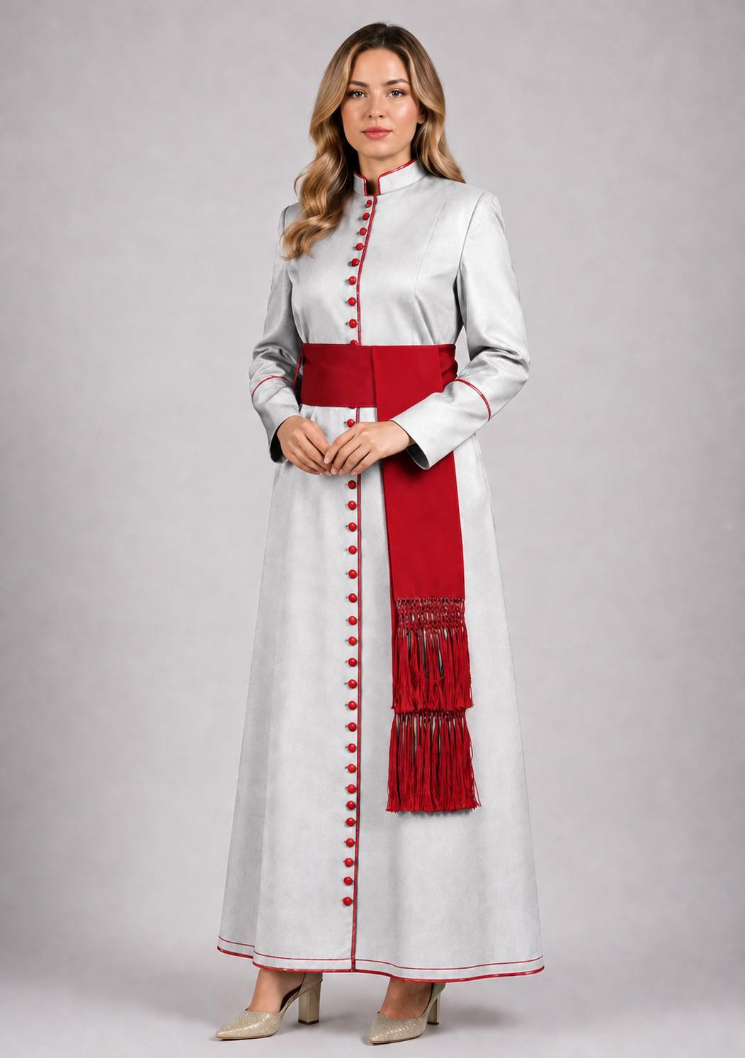 Woman wearing a long white dress with red accents on a plain background