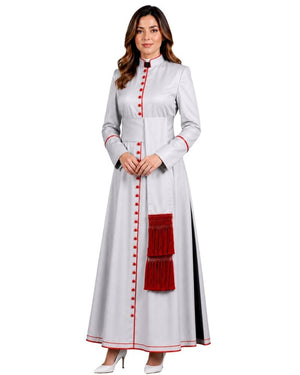 A woman modeling a long white cassock with red button details, red piping, and a red tassel accent, set against a plain white background.