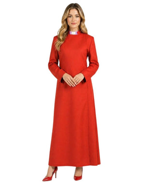 A woman modeling a long-sleeved, high-neck cassock with black cuffs, paired with red high heels, against a plain white background.