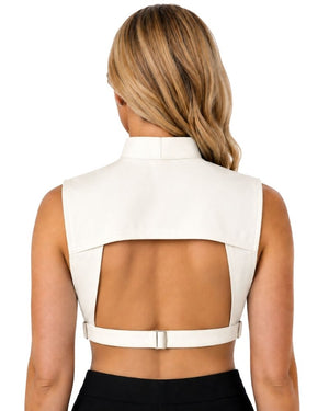 A woman viewed from the back wearing a sleeveless clergy dickey with a large open back and a matching waist strap, shown against a plain white background.