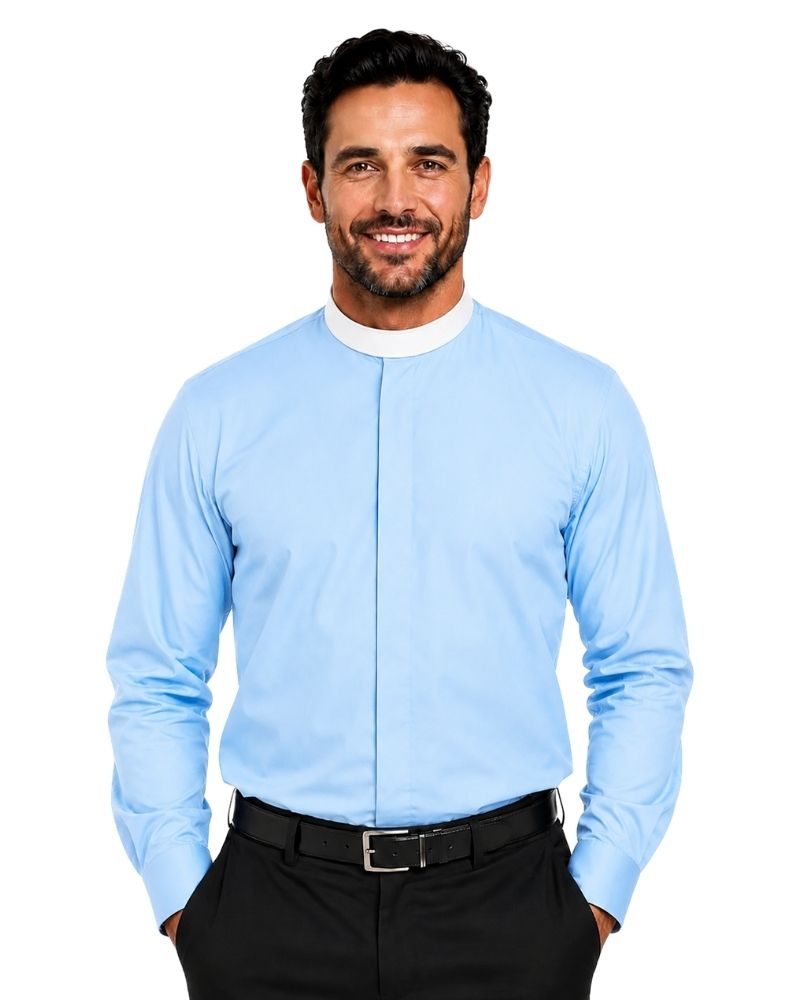 A smiling man wearing a light blue long-sleeve clerical shirt with a unique center-front split design, paired with black trousers and a black belt, against a solid white background.