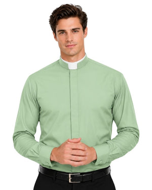 A man wearing a light sage green long-sleeve clerical shirt with a white collar, paired with a black belt, against a plain white background.