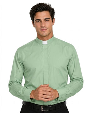 A man wearing a light sage green long-sleeve clerical shirt with a white collar tab, paired with a black belt and trousers, against a plain white background.