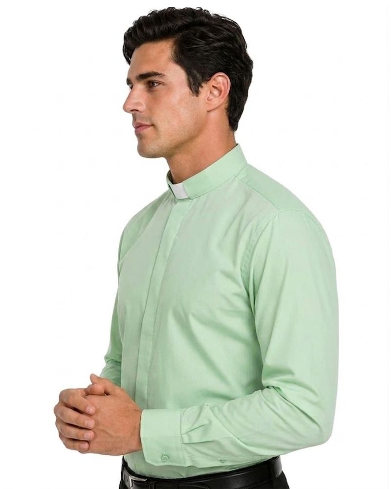 A man wearing a light sage green long-sleeve clerical shirt, shown in a side profile against a plain white background.