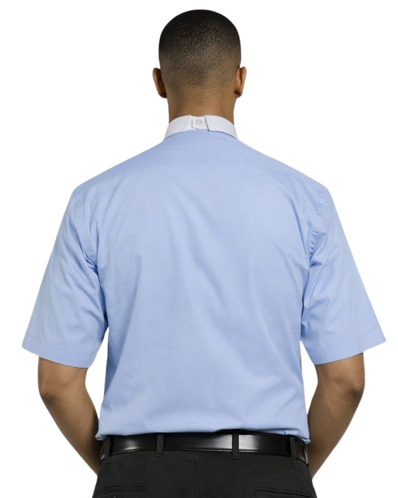 Man wearing a light blue shirt with a white collar and black pants on a white background