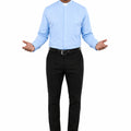Man wearing a light blue shirt and black pants on a white background