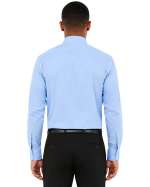 Man wearing a light blue shirt and black pants on a white background