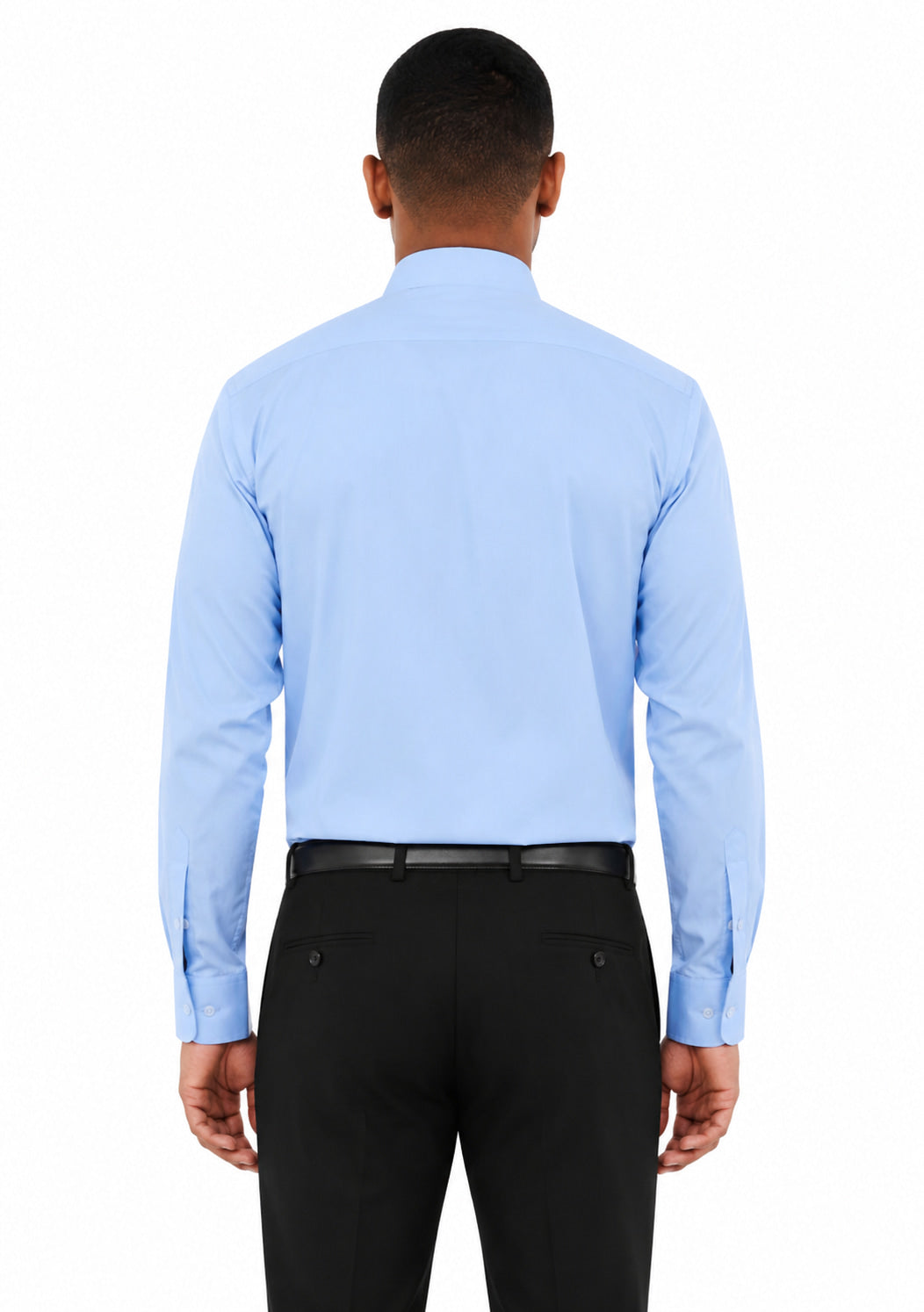 Man wearing a light blue dress shirt and black pants on a white background