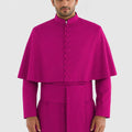 Man wearing a bright pink robe on a white background