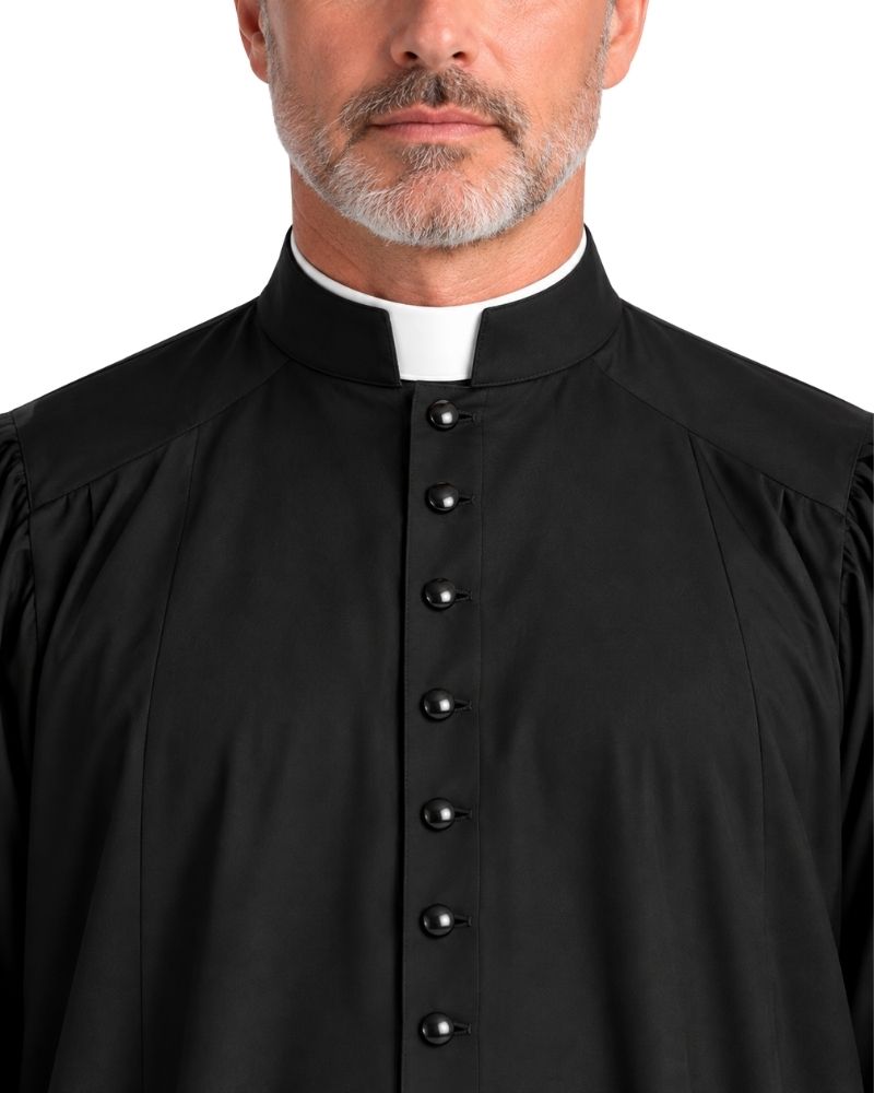 A close-up of a man wearing a Men’s Black Minister Clergy Robe with a white collar and black front buttons, shown against a plain white background.