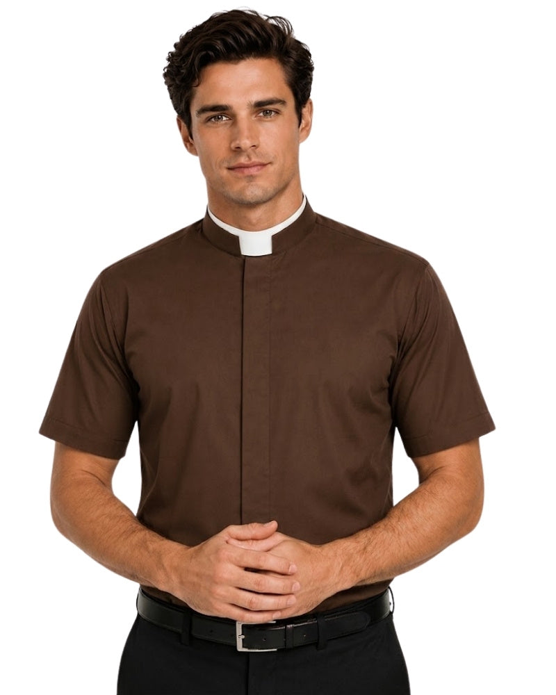 A man wearing a brown short-sleeve clerical shirt with a white collar, paired with black trousers and a black belt, against a plain white background.