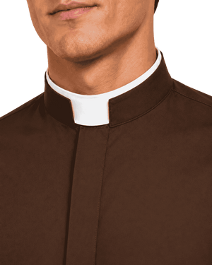 Close-up of a man wearing a brown clerical shirt or robe with a white collar against a plain white background.