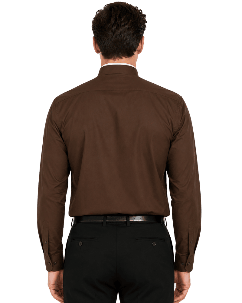 A man viewed from the back wearing a brown long-sleeve clerical shirt, black trousers, and a black belt against a plain white background.