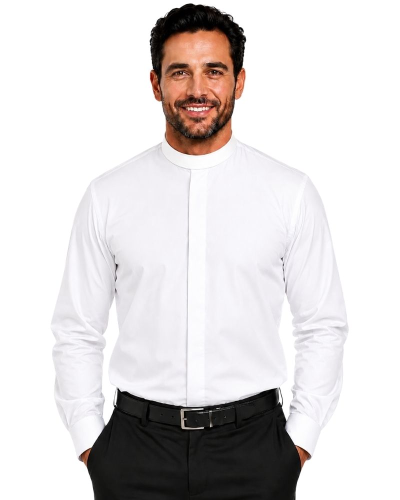 A smiling man wearing a white long-sleeve clerical shirt with a high mock neck and a central pleat detail, paired with black trousers and a black belt, against a plain white background.