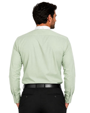 A man viewed from the back wearing a light sage green long-sleeve clerical shirt, black trousers, and a black belt against a plain white background.