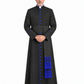 A man wearing a Obsidian Royal Blue Clerical Cassock with bright blue trim, blue buttons, and a matching blue sash with tassels, standing against a plain white studio background.