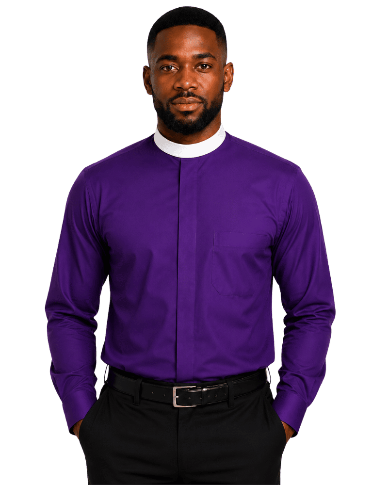 A man wearing a vibrant purple long-sleeve clerical shirt with a mock neck and a chest pocket, paired with black trousers and a black belt, set against a plain white background.