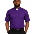 A man wearing a purple short-sleeve clerical shirt with a white collar tab, paired with black trousers and a black belt, photographed against a plain white background.
