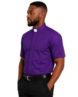 A man wearing a purple short-sleeve clerical shirt with a white collar, paired with black trousers and a black belt, shown against a plain white background.
