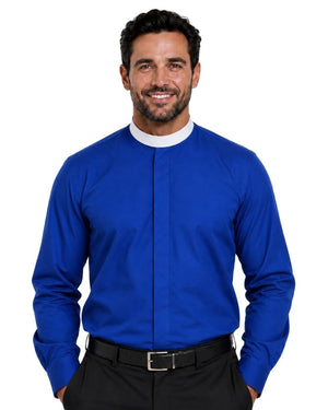 A smiling man wearing a royal blue long-sleeve clerical shirt with a white collar, paired with black trousers and a black belt, against a plain white background.