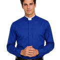 A man wearing a royal blue long-sleeve clerical shirt with a white collar trim, paired with black trousers and a black belt, against a plain white background.