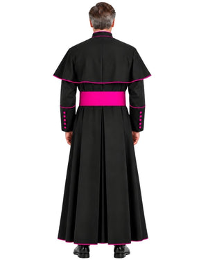 A man viewed from the back wearing a Traditional Clerical Cassock With Magenta Trim, a wide pink waist sash, and pink button accents on the sleeves, against a plain white background.