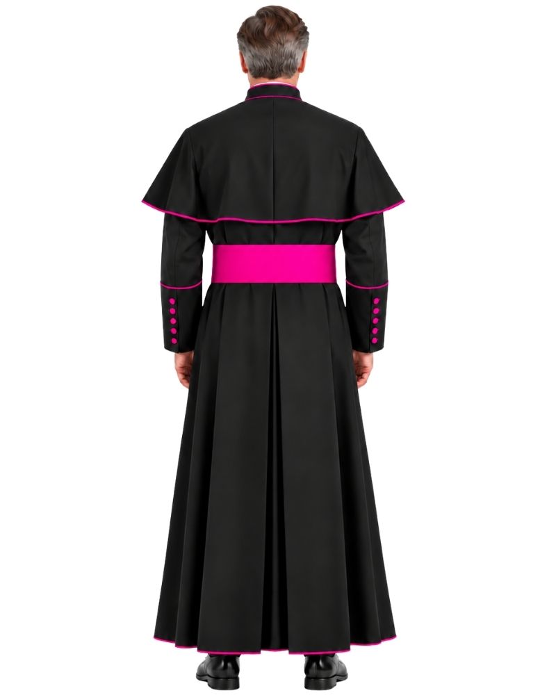 A man viewed from the back wearing a Traditional Clerical Cassock With Magenta Trim, a wide pink waist sash, and pink button accents on the sleeves, against a plain white background.