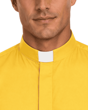 A close-up of a man wearing a yellow long-sleeve clerical shirt with a high collar and a white clerical collar, set against a plain white background.