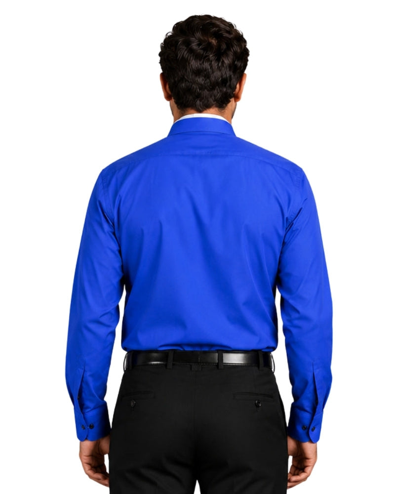Man wearing a blue clerical shirt with a white collar against a white background