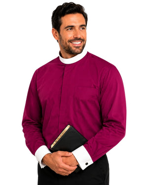 Man wearing a magenta shirt with a white collar holding a black book on a white background