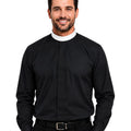 Man wearing a black long-sleeve shirt with a white collar on a white background