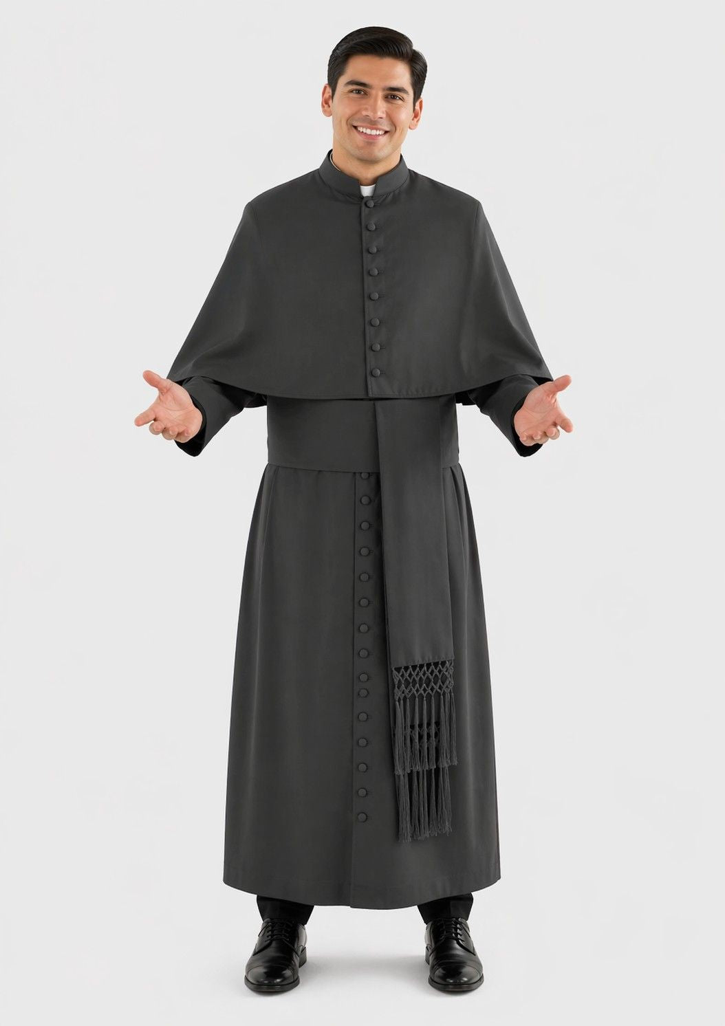 Man wearing a black religious robe on a white background