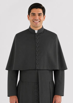 Man wearing a black cassock on a white background